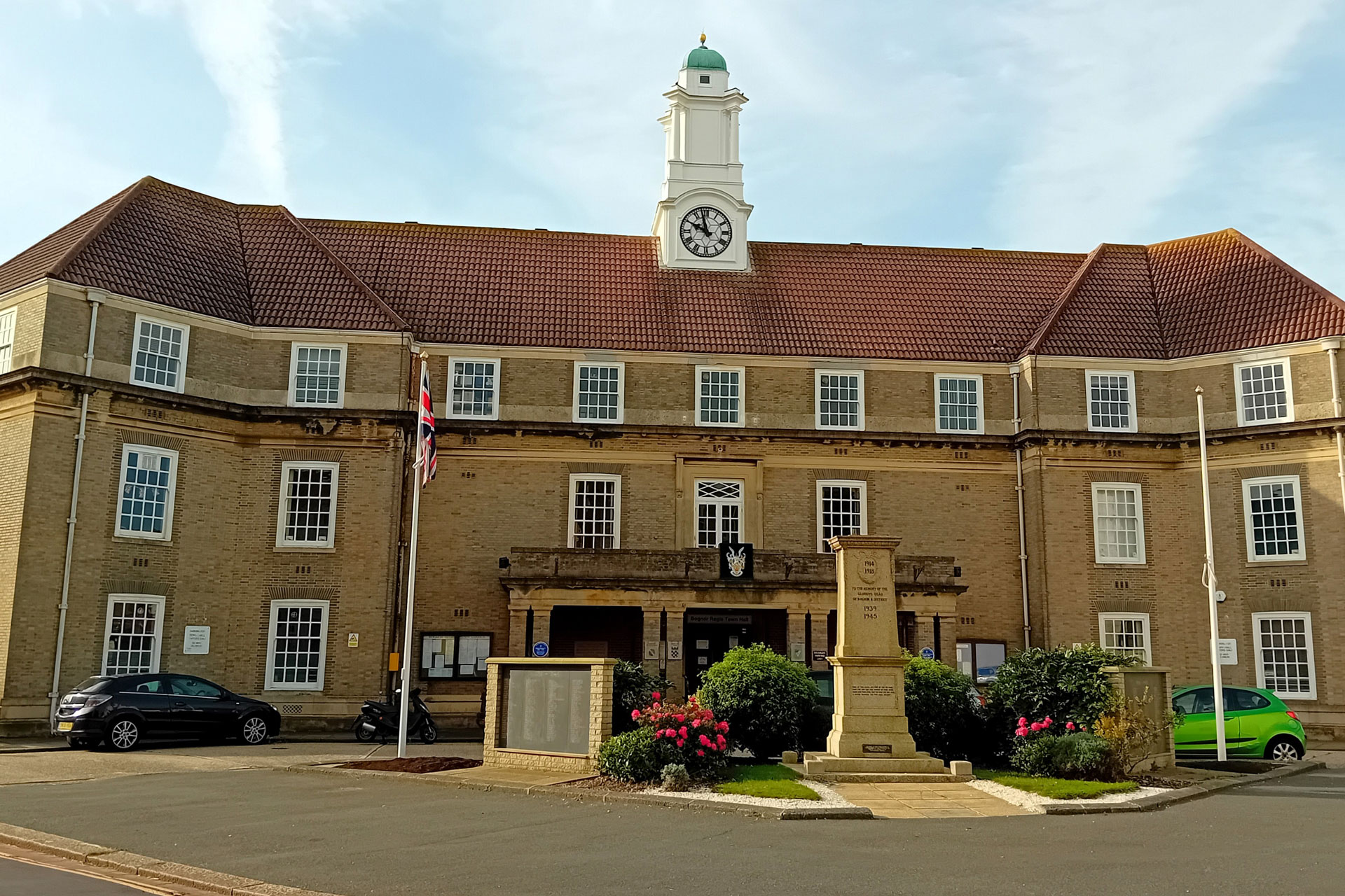 bognor Front view of Bognor Regis Town Hall with its iconic clock tower and war memorial – highlighting Force One Homes' expert building services in Bognor, including new builds, home extensions, loft conversions, kitchen renovations, and garden rooms.