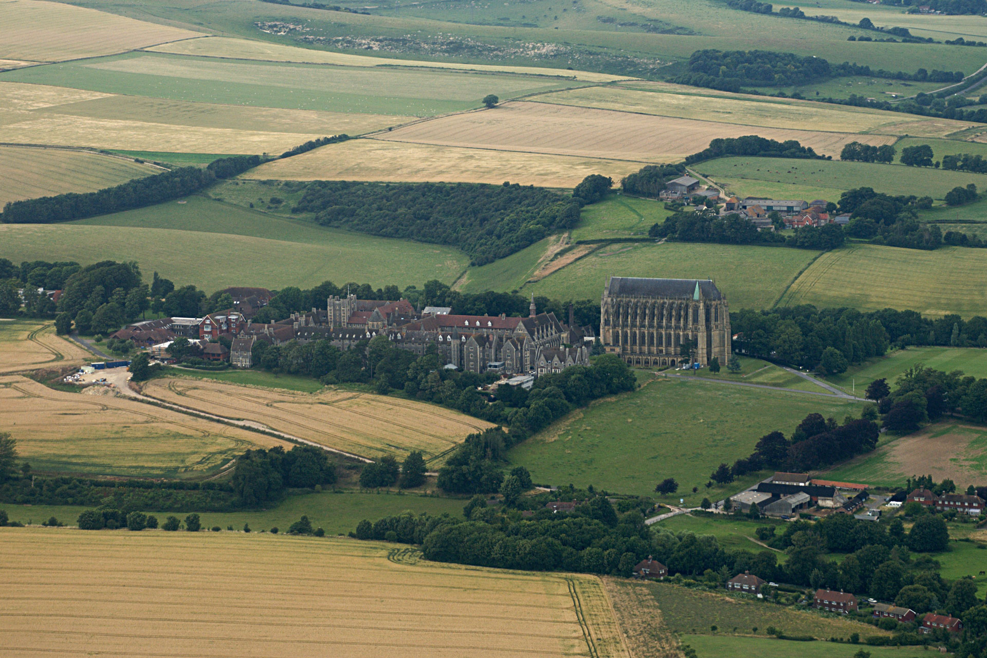 lancing Aerial view of Lancing College and the surrounding South Downs landscape – representing Force One Homes’ full-service building expertise in Lancing, including bespoke new builds, tailored extensions, loft conversions, and premium kitchen renovations.