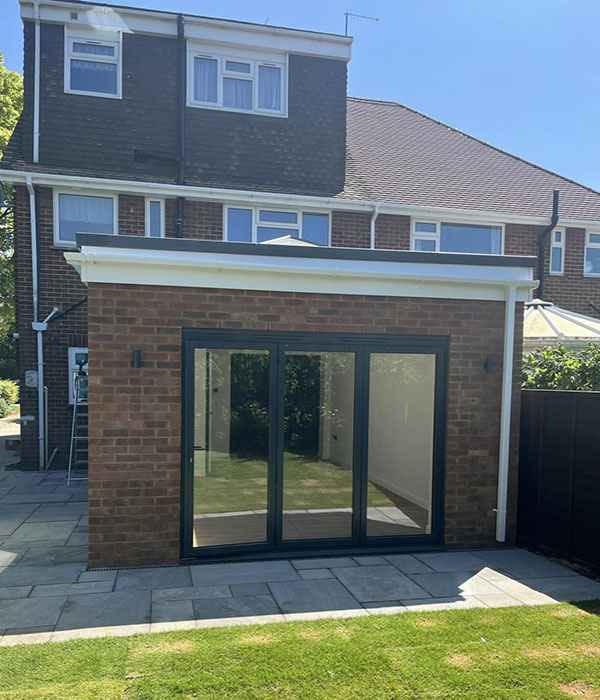 Stylish property extension in Worthing with bi-fold doors and open-plan living Property extension in Worthing - modern rear house extension project