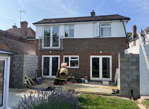 Large two-storey home in Adversane undergoing rear extension and garden renovation – builder in Worthing area.