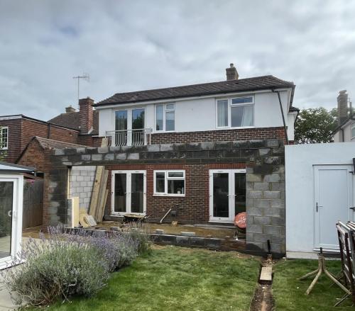 Mid-construction home extension project with cavity wall structure in progress – Adversane property near Worthing.