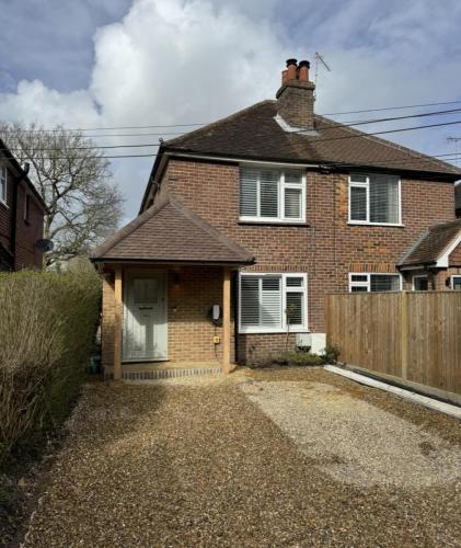 Front view of brick semi-detached home in Fenns Lane before rear extension and renovation work.