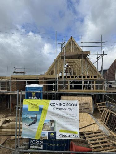 Timber frame installation on new builds in Worthing – residential development progressing toward summer 2024 launch.