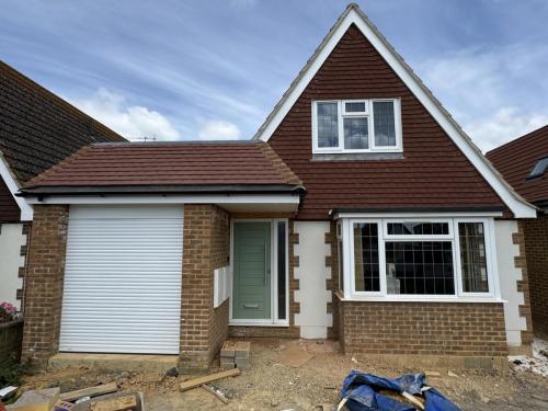 Finished external brickwork and windows installed on North Avenue new build property in Worthing.