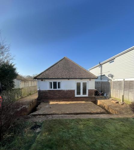 Excavation completed for rear extension at Ocean Drive property in Worthing, showing pre-construction stage.